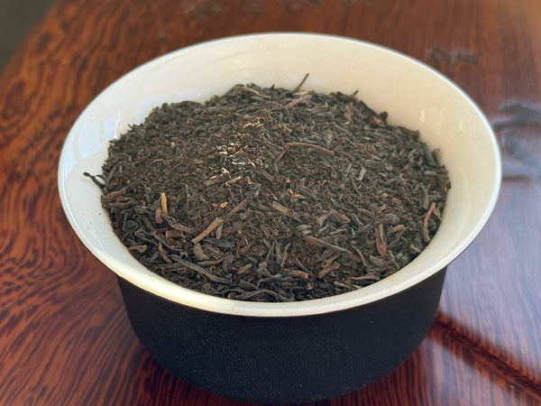 Load image into Gallery viewer, A blend of broken and orange flowery pekoe teas, following a traditional (secret) HK street vendor recipe.
